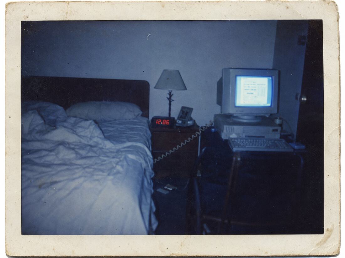 Recovered room photograph marked 12:86 AM